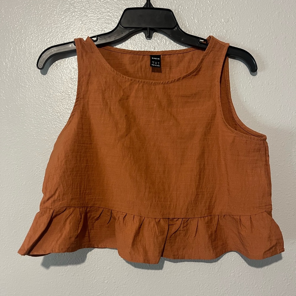 Women's Ruffle Hem Sleeveless Blouse